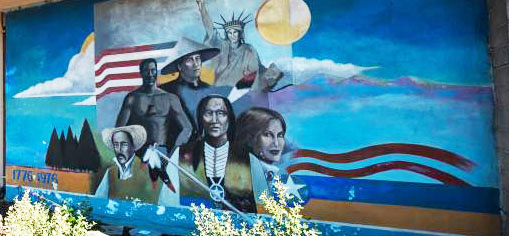 Mural depicting immigrants in the USA